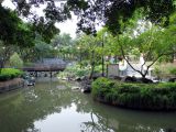 Picture-Small bridge and flowing water in the park