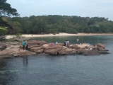 Picture-Rocky beach next to the pier